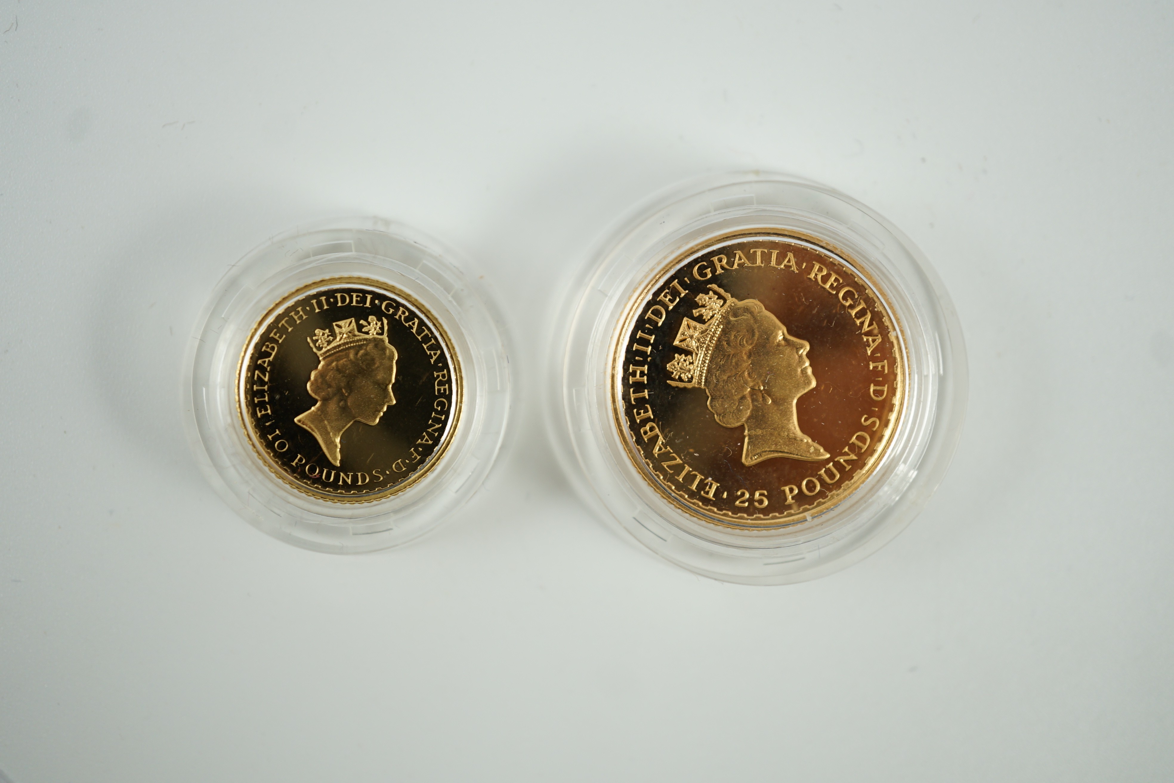 Elizabeth II (1952-2022), Royal mint gold proof Britannia £10, 1997 and gold proof Britannia quarter oz. £25, 1987, both cased